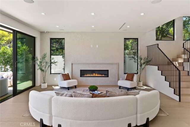 14738 Otsego St, Sherman Oaks, CA 91403 - living room with recessed lighting, stairway, wood finished floors, and a premium fireplace