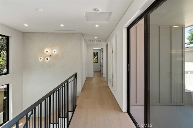 14738 Otsego St, Sherman Oaks, CA 91403 - hallway with light wood finished floors, healthy amount of natural light, and recessed lighting