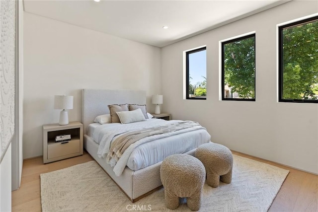 14738 Otsego St, Sherman Oaks, CA 91403 - bedroom with multiple windows, light wood-style flooring, and recessed lighting
