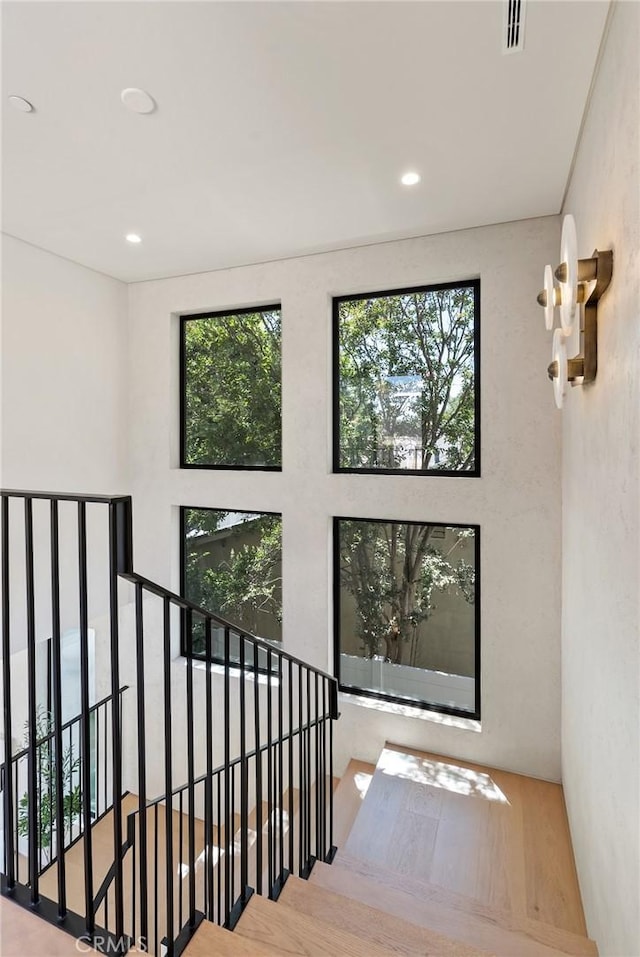 14738 Otsego St, Sherman Oaks, CA 91403 - stairway with plenty of natural light, wood finished floors, and recessed lighting
