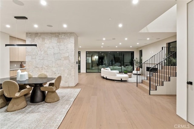 14738 Otsego St, Sherman Oaks, CA 91403 - dining area with light wood-style floors, stairway, and recessed lighting