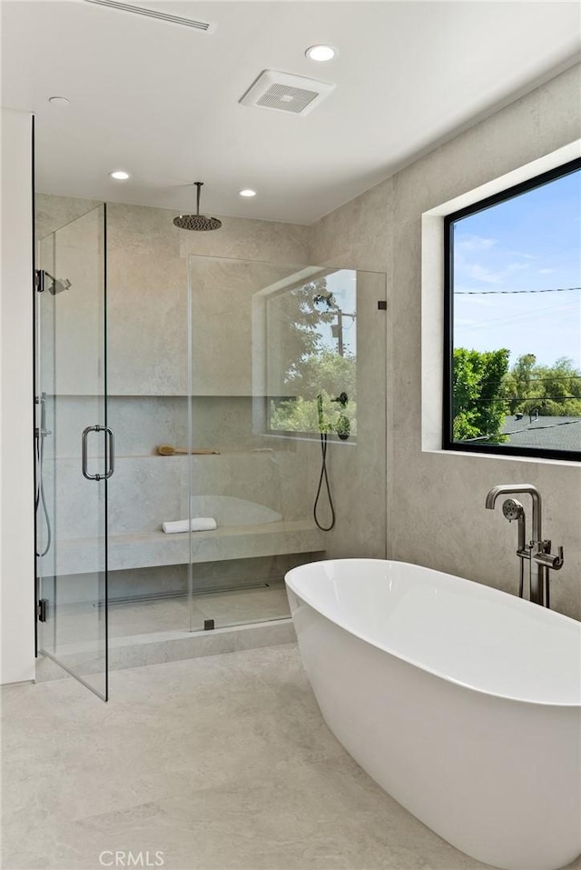 14738 Otsego St, Sherman Oaks, CA 91403 - full bathroom featuring a stall shower, a soaking tub, and recessed lighting