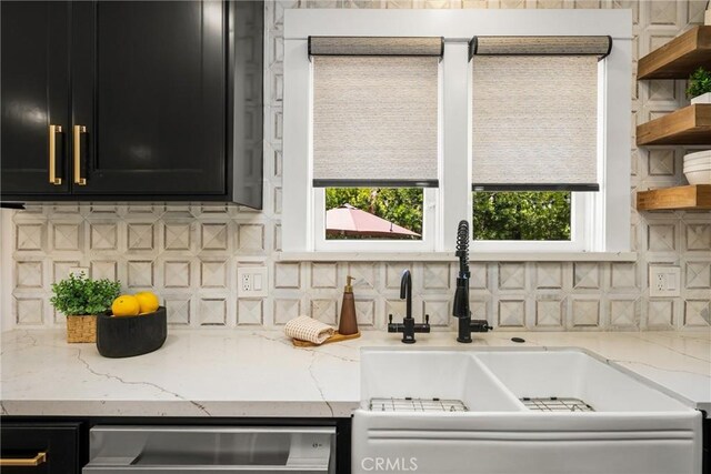 705 E Palm Ave, Orange, CA 92866 - kitchen with dark cabinets, dishwasher, open shelves, decorative backsplash, and light stone counters