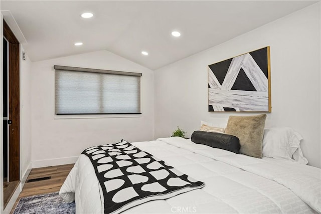 705 E Palm Ave, Orange, CA 92866 - bedroom featuring wood finished floors, lofted ceiling, and recessed lighting