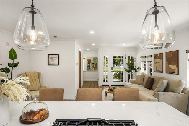 705 E Palm Ave, Orange, CA 92866 - living room featuring ornamental molding, wood finished floors, and recessed lighting