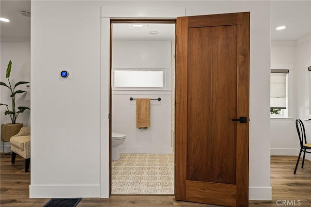 705 E Palm Ave, Orange, CA 92866 - bathroom featuring ornamental molding, wood finished floors, and recessed lighting