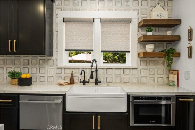 705 E Palm Ave, Orange, CA 92866 - kitchen featuring stainless steel appliances and dark cabinets