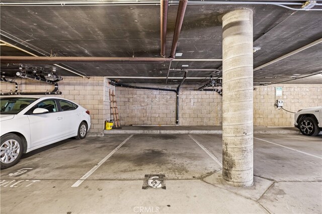 1629 Cherry Ave Unit 102, Long Beach, CA 90813 - parking garage featuring concrete block wall