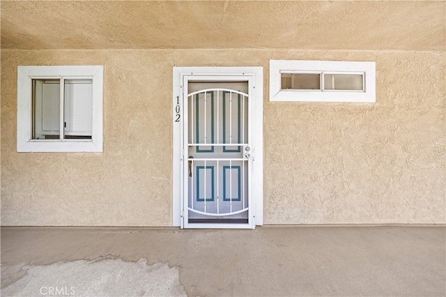 1629 Cherry Ave Unit 102, Long Beach, CA 90813 - view of exterior entry with stucco siding