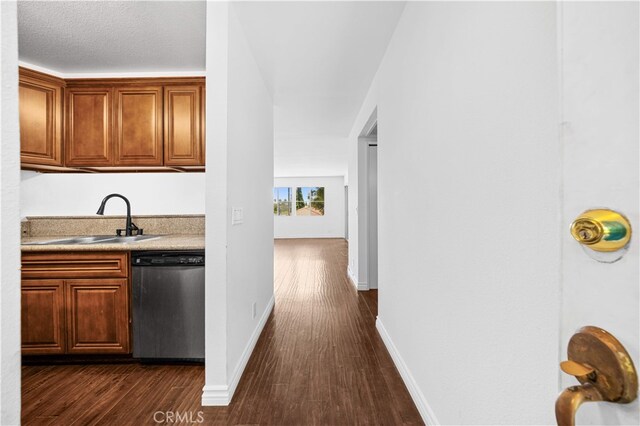1629 Cherry Ave Unit 102, Long Beach, CA 90813 - bar area with stainless steel dishwasher and dark wood-style flooring