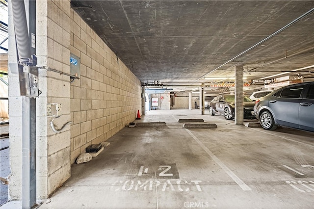 1629 Cherry Ave Unit 102, Long Beach, CA 90813 - parking garage featuring concrete block wall