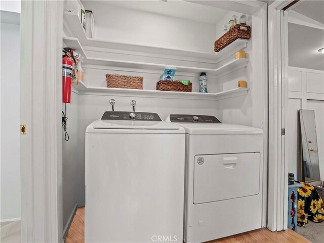 1511 N Maple St, Burbank, CA 91505 - washroom with separate washer and dryer and light wood-style flooring