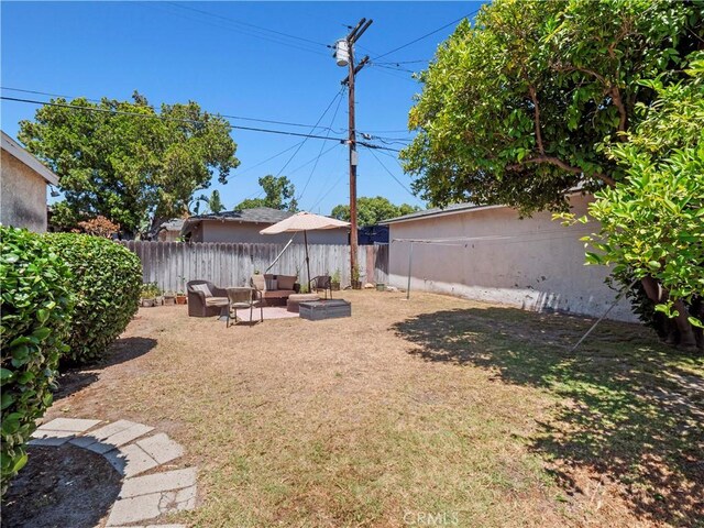 1511 N Maple St, Burbank, CA 91505 - fenced backyard featuring outdoor lounge area