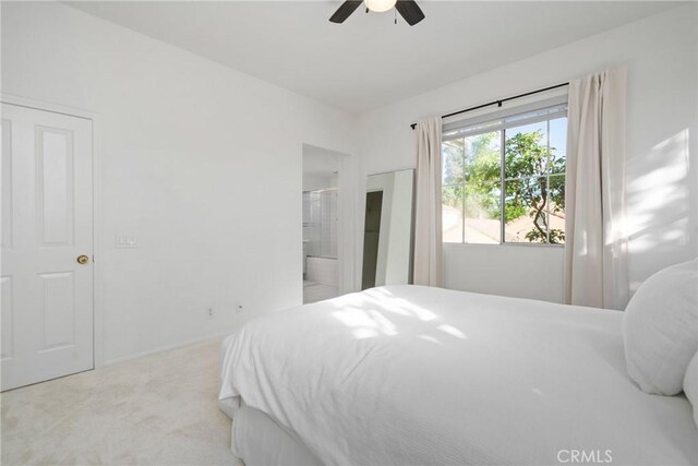 26 Le Vanto, Irvine, CA 92606 - bedroom featuring carpet, ensuite bathroom, and a ceiling fan