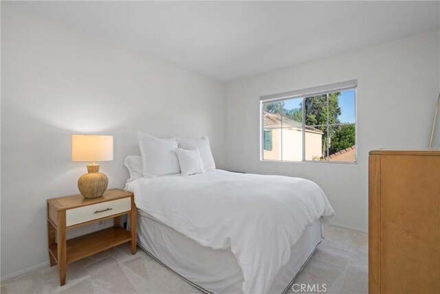26 Le Vanto, Irvine, CA 92606 - bedroom featuring light carpet and baseboards