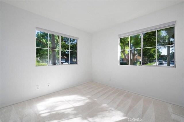 26 Le Vanto, Irvine, CA 92606 - carpeted spare room featuring healthy amount of natural light