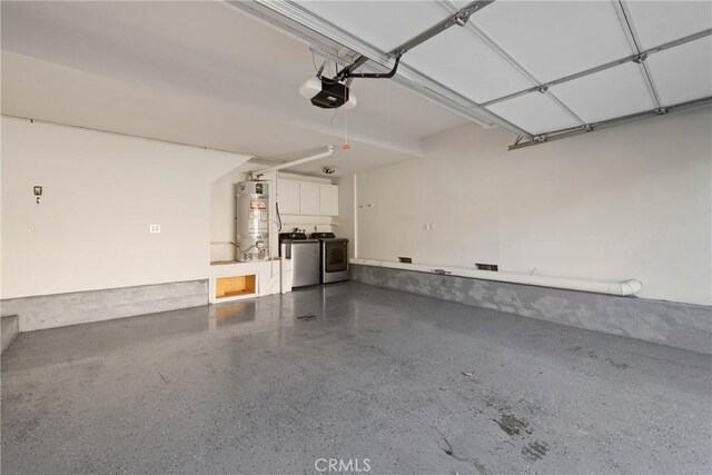 26 Le Vanto, Irvine, CA 92606 - garage featuring strapped water heater, independent washer and dryer, and a garage door opener