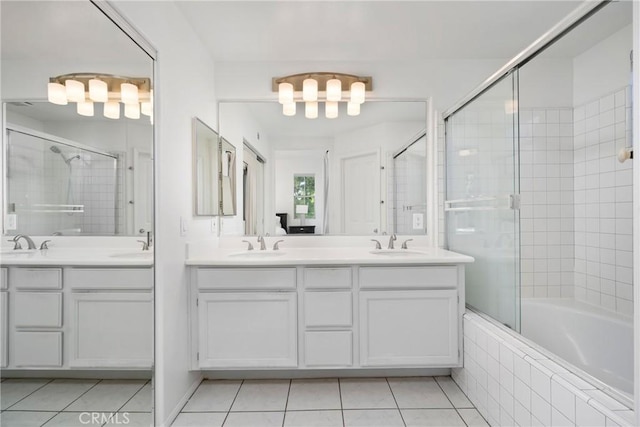 26 Le Vanto, Irvine, CA 92606 - full bathroom featuring tile patterned floors, double vanity, a chandelier, and tiled shower / bath