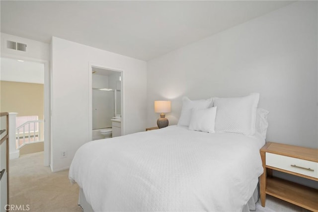 26 Le Vanto, Irvine, CA 92606 - bedroom with light carpet and connected bathroom