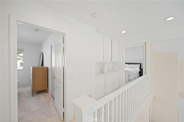 26 Le Vanto, Irvine, CA 92606 - corridor with light carpet and recessed lighting