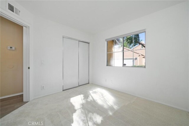 26 Le Vanto, Irvine, CA 92606 - unfurnished bedroom with carpet flooring and a closet