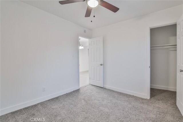 9218 Hooper Ave, Los Angeles, CA 90002 - unfurnished bedroom featuring carpet, a closet, and a ceiling fan