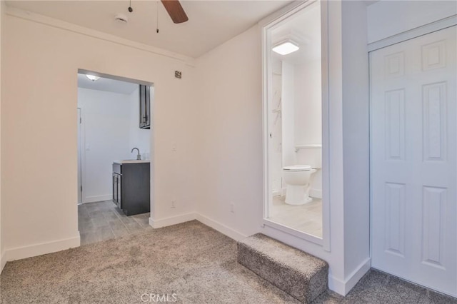 9218 Hooper Ave, Los Angeles, CA 90002 - spare room with carpet floors and a ceiling fan