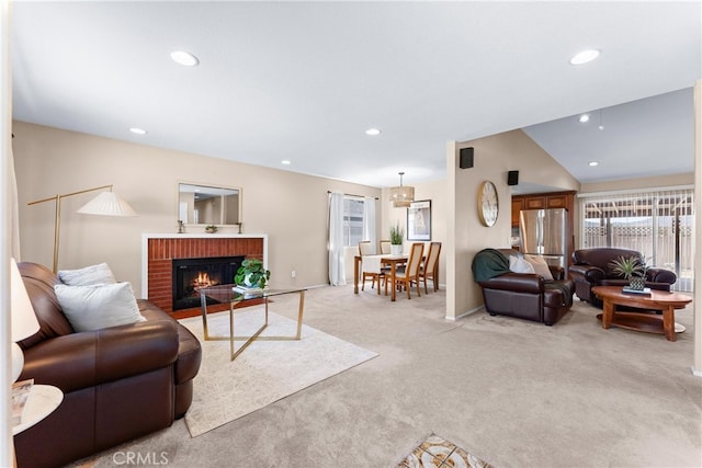 17300 Azalea Ct, La Puente, CA 91744 - living area featuring light colored carpet, healthy amount of natural light, a brick fireplace, and recessed lighting