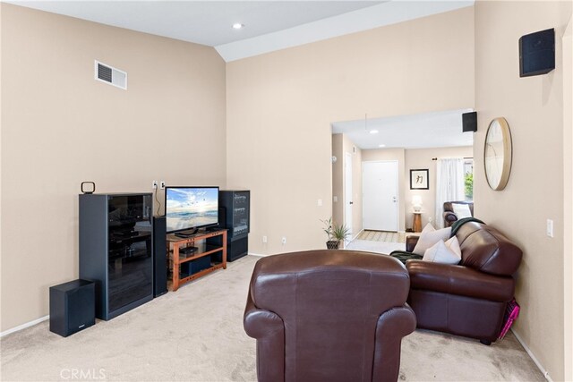 17300 Azalea Ct, La Puente, CA 91744 - living area with light colored carpet, high vaulted ceiling, and recessed lighting