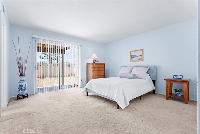 17300 Azalea Ct, La Puente, CA 91744 - carpeted bedroom with access to outside and baseboards