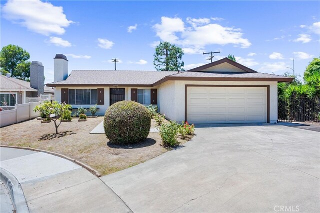 17300 Azalea Ct, La Puente, CA 91744 - ranch-style home featuring an attached garage, concrete driveway, stucco siding, and a chimney