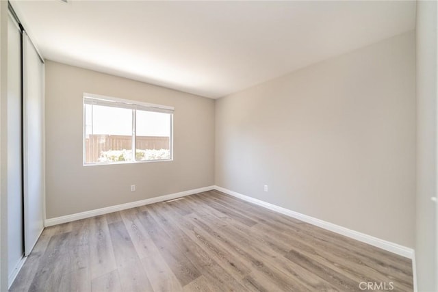 1870 S Jasmin Ct, Loma Linda, CA 92354 - spare room with light wood-type flooring and baseboards