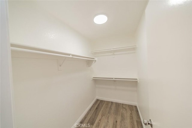 1870 S Jasmin Ct, Loma Linda, CA 92354 - walk in closet featuring wood finished floors
