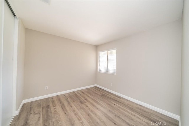 1870 S Jasmin Ct, Loma Linda, CA 92354 - spare room with light wood-type flooring and baseboards