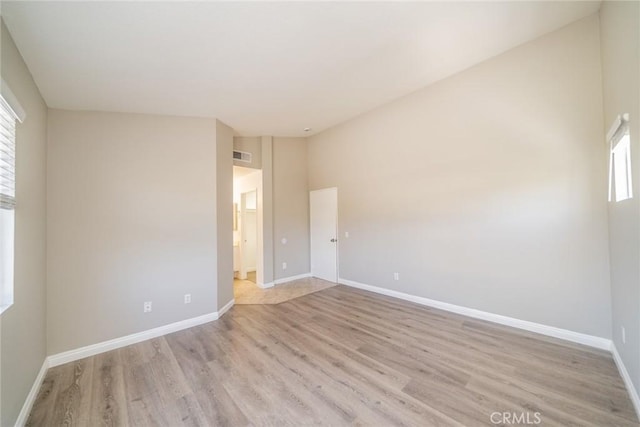 1870 S Jasmin Ct, Loma Linda, CA 92354 - spare room featuring light wood-style floors and baseboards