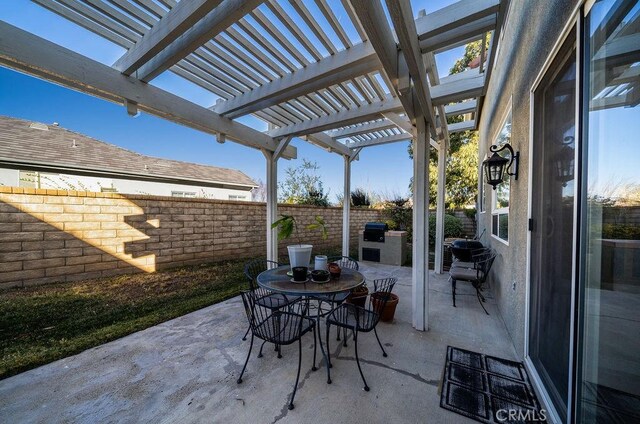 27829 Coldsprings Pl, Valencia, CA 91354 - fenced backyard with a patio, a pergola, area for grilling, and outdoor dining space