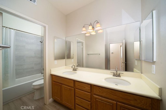 27829 Coldsprings Pl, Valencia, CA 91354 - bathroom with wood finished floors, double vanity, and shower / bath combo with shower curtain