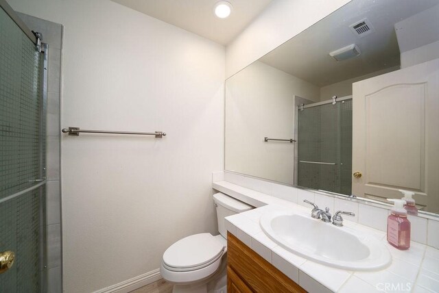 27829 Coldsprings Pl, Valencia, CA 91354 - bathroom with vanity and a shower with shower door