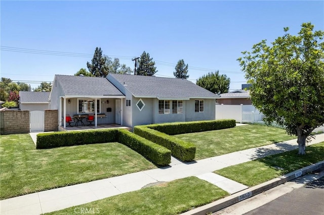 16728 Los Alimos St, Granada Hills, CA 91344 - ranch-style house featuring a shingled roof, covered porch, and stucco siding