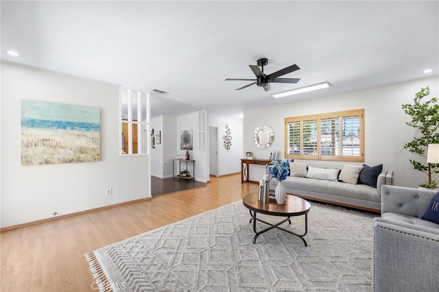 16728 Los Alimos St, Granada Hills, CA 91344 - living room with wood finished floors, a ceiling fan, and recessed lighting