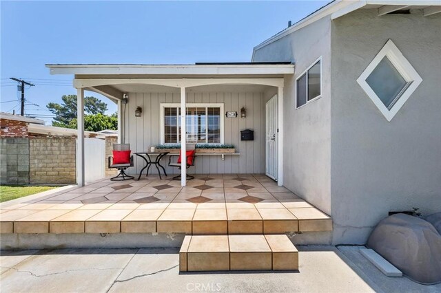 16728 Los Alimos St, Granada Hills, CA 91344 - doorway to property with a patio area