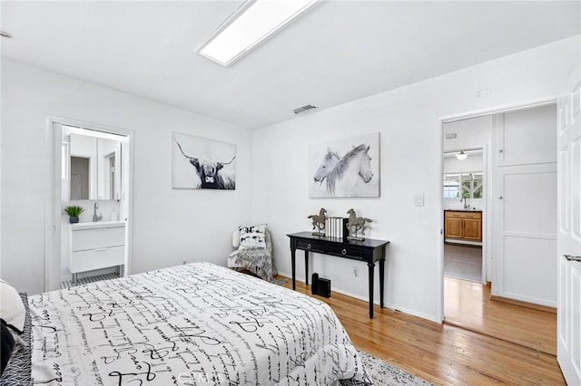 16728 Los Alimos St, Granada Hills, CA 91344 - bedroom featuring light wood-style floors and ensuite bathroom