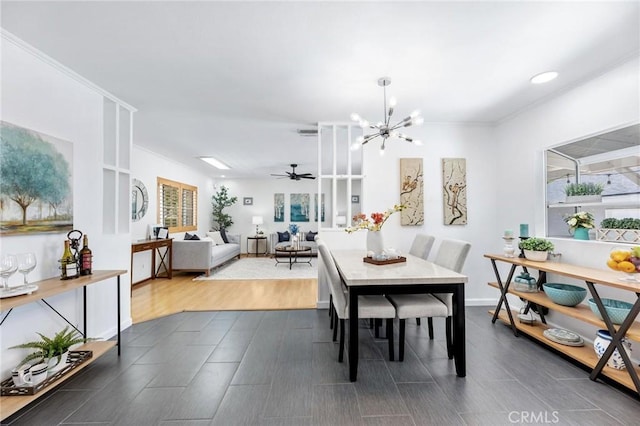 16728 Los Alimos St, Granada Hills, CA 91344 - dining area with plenty of natural light, dark wood-style floors, ceiling fan, a chandelier, and recessed lighting