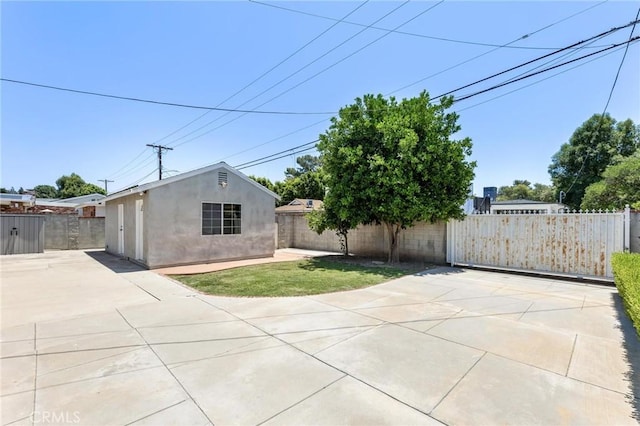 16728 Los Alimos St, Granada Hills, CA 91344 - fenced backyard with a patio and an outdoor structure