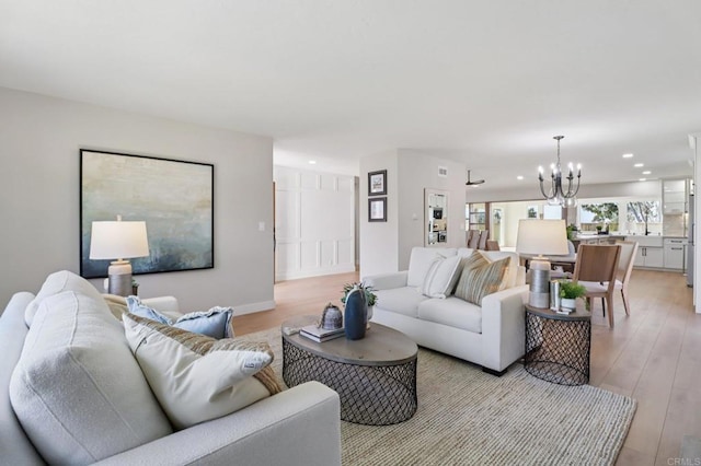 1358 Walnutview Dr, Encinitas, CA 92024 - living area featuring a chandelier, recessed lighting, and light wood finished floors