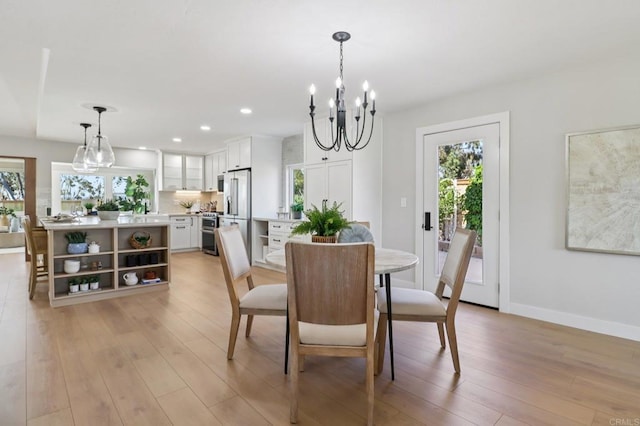 1358 Walnutview Dr, Encinitas, CA 92024 - dining area with a chandelier, light wood-style flooring, and recessed lighting