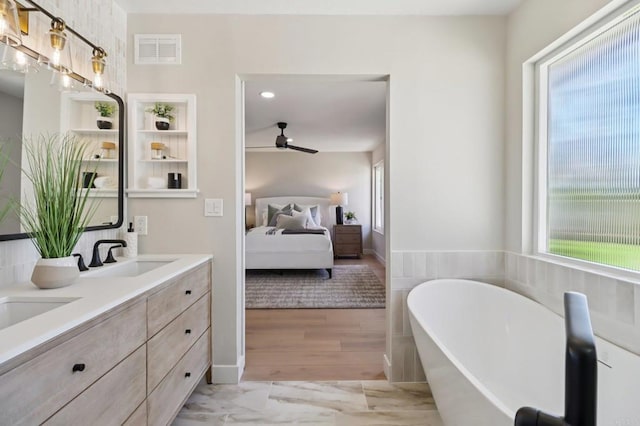 1358 Walnutview Dr, Encinitas, CA 92024 - ensuite bathroom with a freestanding tub, ceiling fan, and double vanity