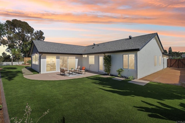 1358 Walnutview Dr, Encinitas, CA 92024 - back of house at dusk featuring a patio, stucco siding, and roof with shingles