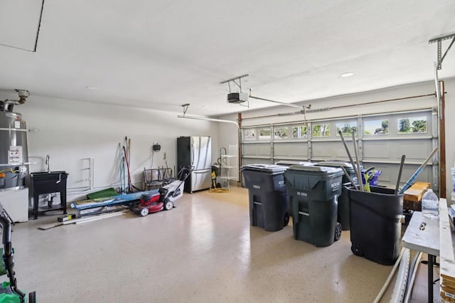 1358 Walnutview Dr, Encinitas, CA 92024 - garage with freestanding refrigerator, a garage door opener, and water heater