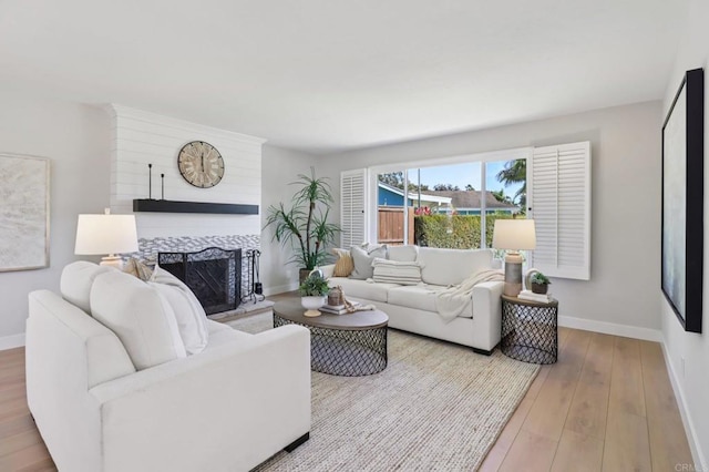 1358 Walnutview Dr, Encinitas, CA 92024 - living room with wood finished floors and a fireplace with raised hearth